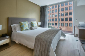 Гостиница 100 Luxury Suites  Богота